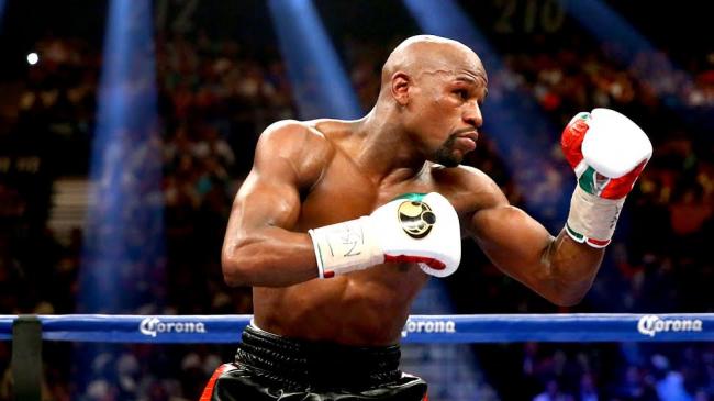 Floyd Mayweather undefeated, beats Pacquiao in richest boxing match 